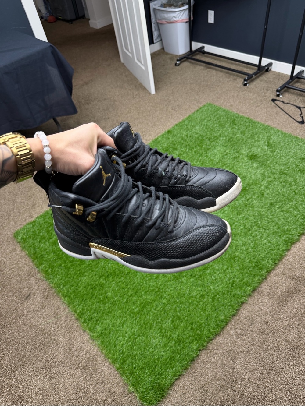 Nike air Jordan 12 Black and Gold High-Top Sneakers
